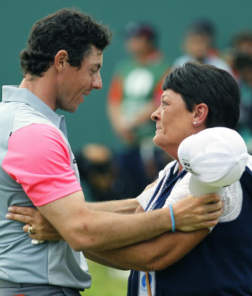 Rory McIlroy celebrates winning the British Open Golf championship with his mother Rosie. (AP)