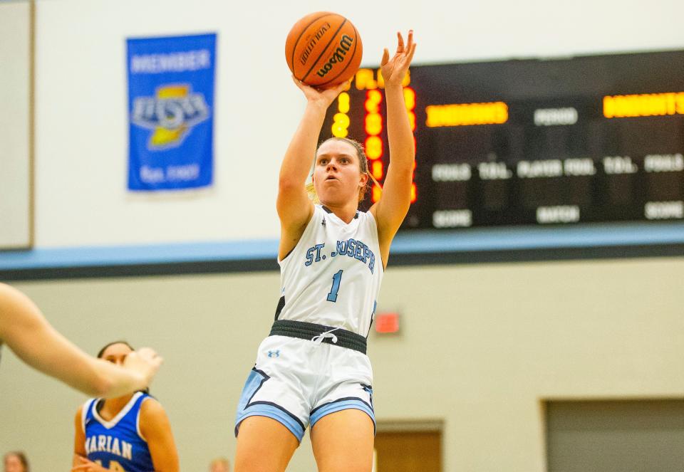 Saint Joseph's /Kelly Ratigan puts up a shot during the Marian vs. Saint Joseph girls basketball game Thursday, Nov. 18, 2021 at Saint Joseph High School. 