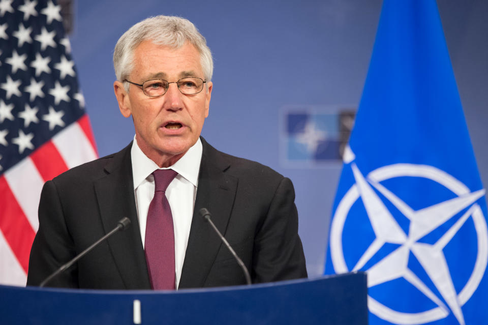 U.S. Secretary of Defense Chuck Hagel addresses the media after a meeting of NATO defense ministers at NATO headquarters in Brussels on Thursday, Feb. 27, 2014. NATO defense ministers, in a second day of meetings, discussed the situation in Ukraine and Afghanistan. (AP Photo/Geert Vanden Wijngaert)