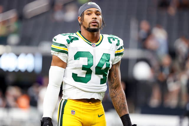 <p>Ian Maule/Getty</p> Jonathan Owens #34 of the Green Bay Packers looks on prior to a game