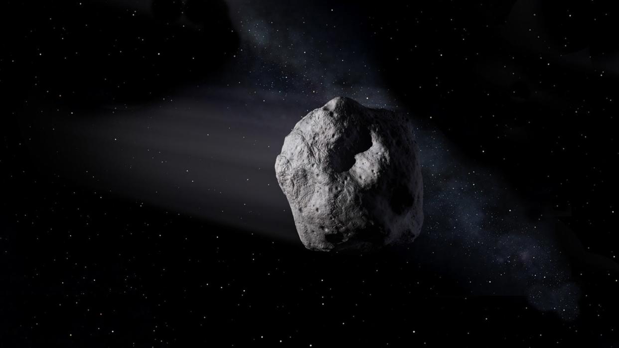 This illustration shows a near-Earth asteroid like asteroid 2020 SW traveling through space (NASA/JPL-Caltech)