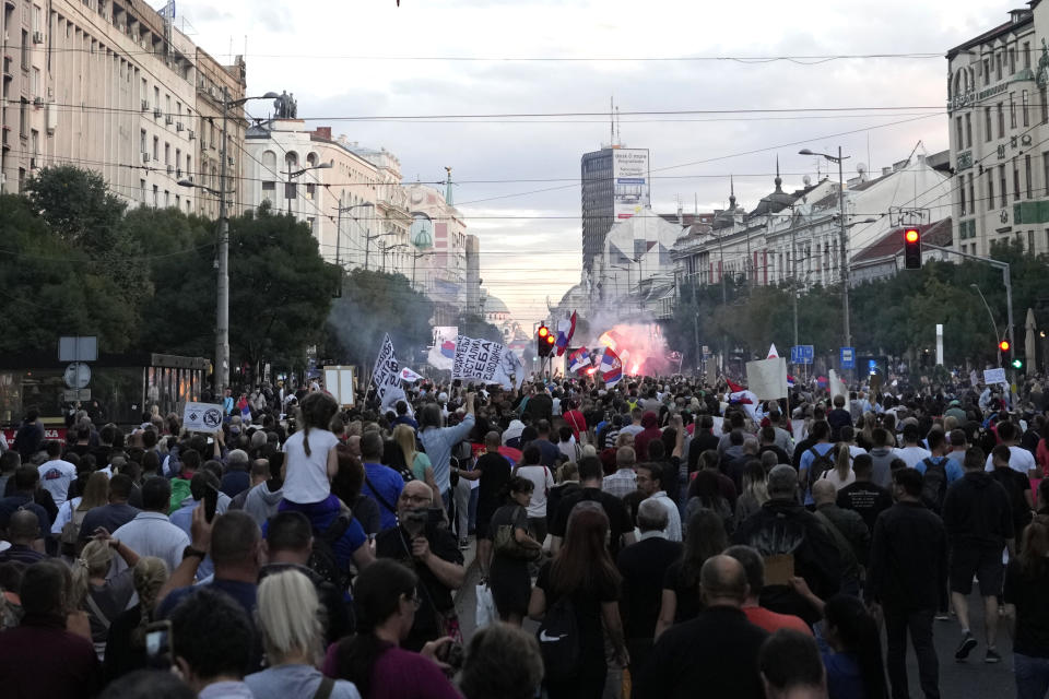 Thousands of demonstrators take the streets to protest potential new COVID-19 restrictions announced by the government in Belgrade, Serbia, Saturday, Sept. 18, 2021. (AP Photo/Darko Vojinovic)