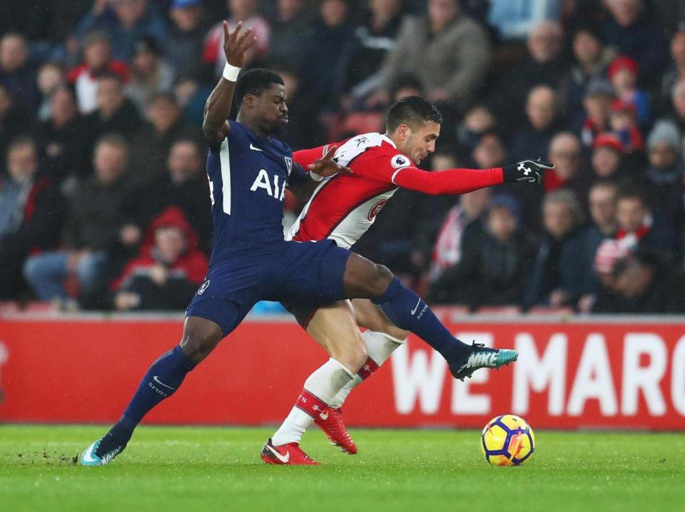 Dusan Tadic and Serge Aurier fight for possession (Getty Images)