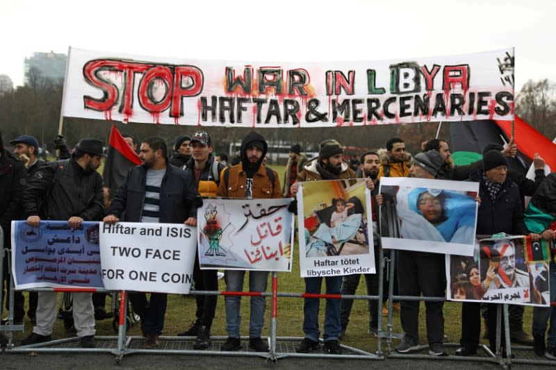 Protesters against Libyan commander Khalifa Haftar gather in front of the Chancellery during the Libya summit in Berlin