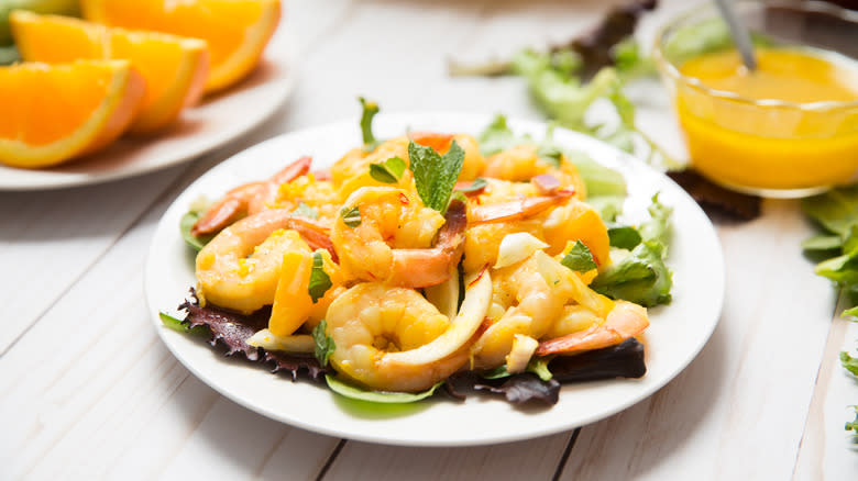 shrimp salad served on table 