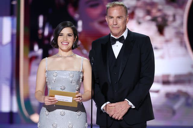 <p>Rich Polk/Golden Globes 2024/Golden Globes 2024 via Getty Images</p> America Ferrera and Kevin Costner at the 81st Golden Globe Awards