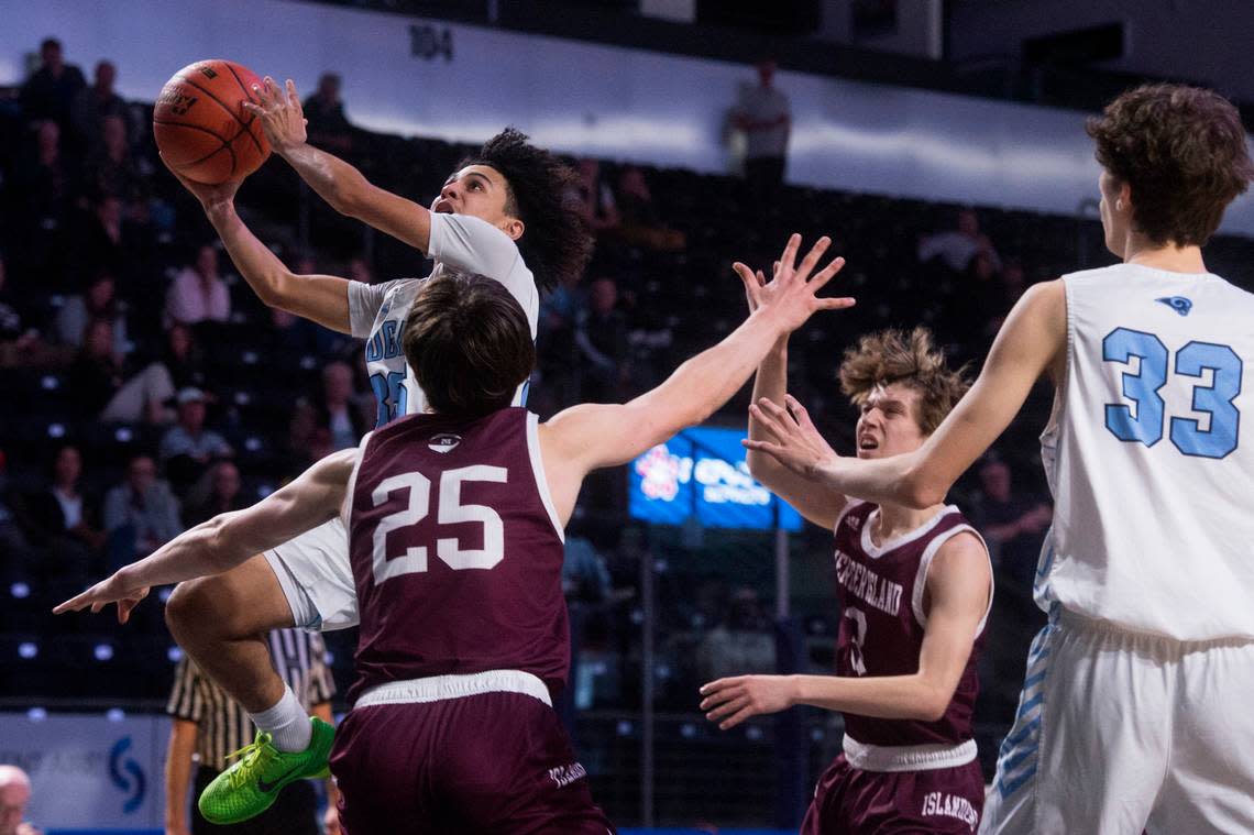 Rogers High School forward Ryan Avary puts up a shot during the third quarter of a basketball game against Mercer Island at the 2023 King Showcase on Monday, Jan. 16, 2023 at the ShoWare Center in Kent, Wash.