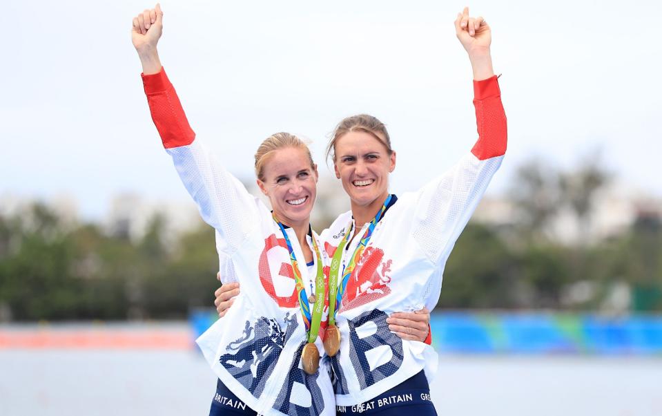 Great Britain's Helen Glover (left) and Heather Stanning (right) celebrate winning gold in the Women's Pair Final at The Lagoa Stadium on the seventh day of the Rio Olympic Games, Brazil - PA/Mike Egerton