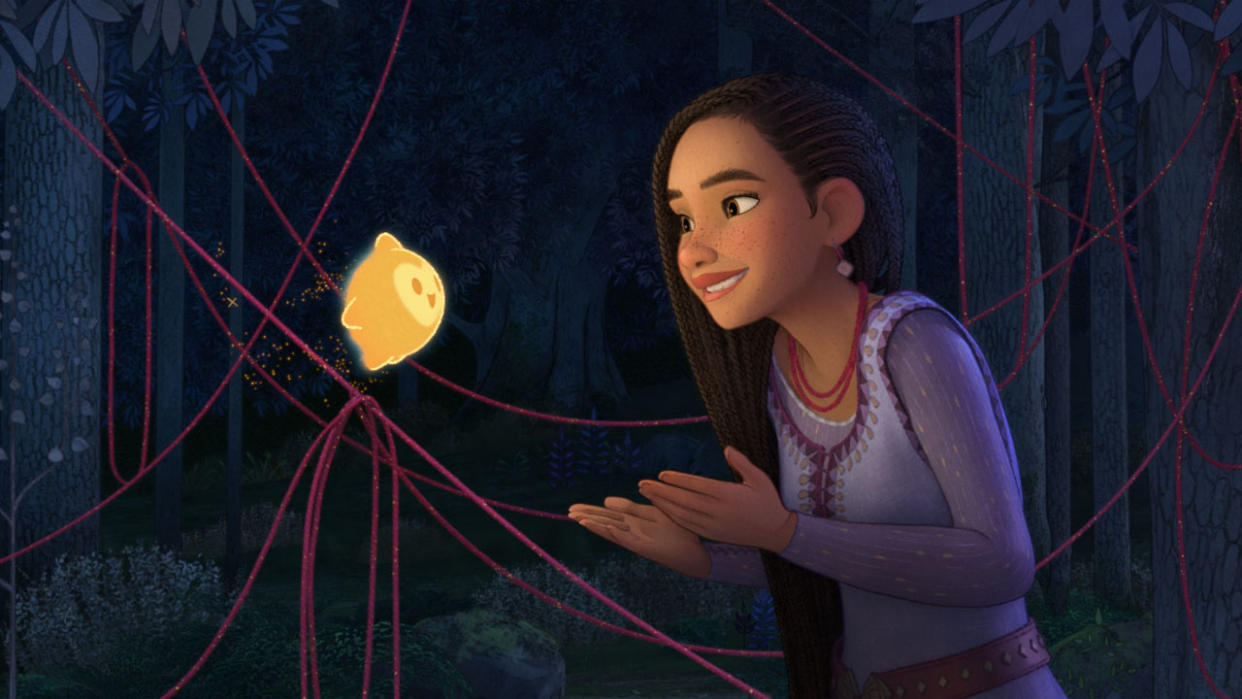  Star smiles at Asha at night time in Disney's Wish movie. 