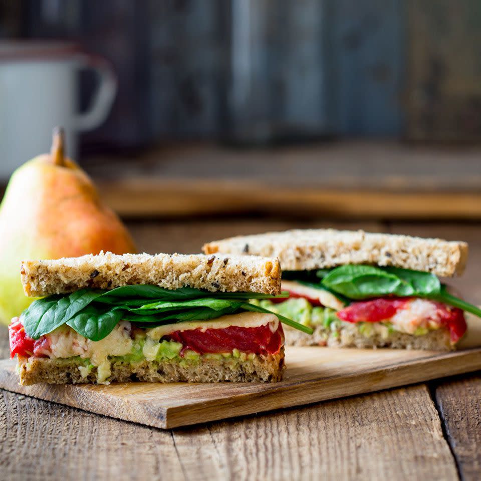 <p>Parmesan cheese is such a bold flavor, you only need 1/4 cup to add a big punch to this vegetarian toaster-oven sandwich. Get a serving of fruit too, when you enjoy the sandwich with a fresh pear.</p> <p> <a href="https://www.eatingwell.com/recipe/260715/tomato-avocado-cheese-sandwich/" rel="nofollow noopener" target="_blank" data-ylk="slk:View Recipe;elm:context_link;itc:0;sec:content-canvas" class="link ">View Recipe</a></p>