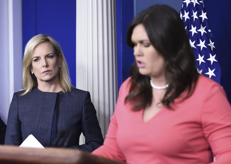 Tempting though it is to assume that Nielsen and Sanders must, on some level, oppose this cruel policy, there’s no reason to believe they have more empathy by virtue of being women. (BRENDAN SMIALOWSKI via Getty Images)