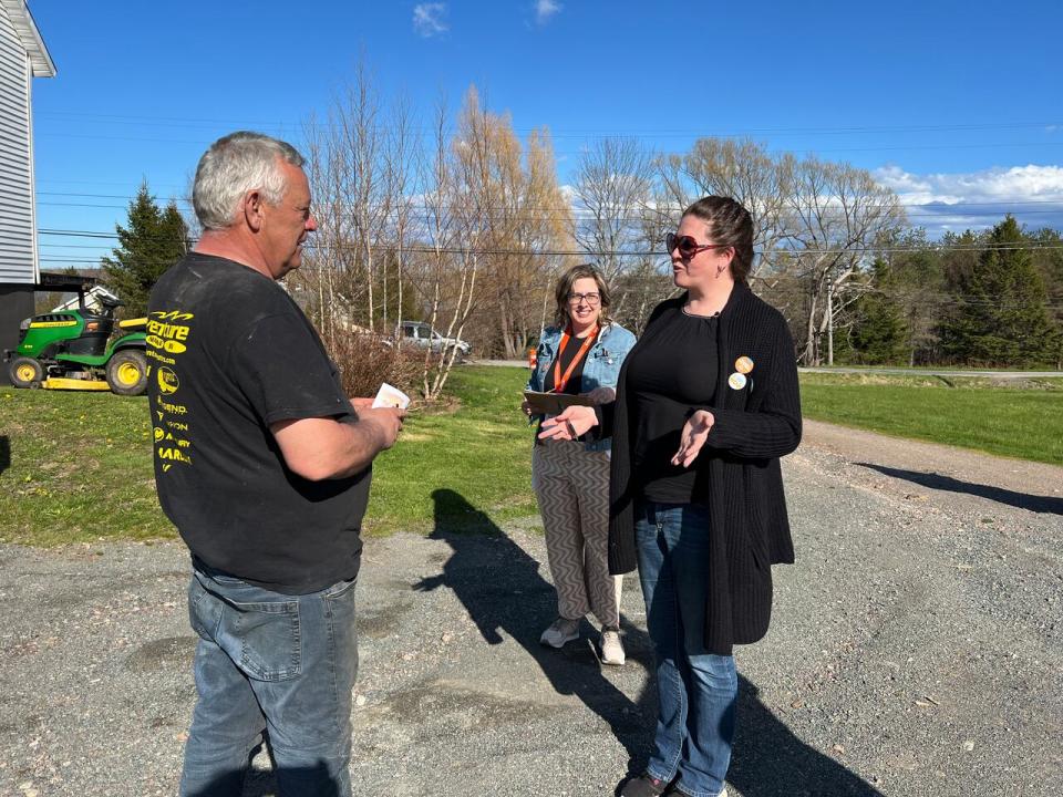 Pictou West NDP candidate Melinda MacKenzie received a hand from NDP MLA Susan LeBlanc as she campaigned on Tuesday. 