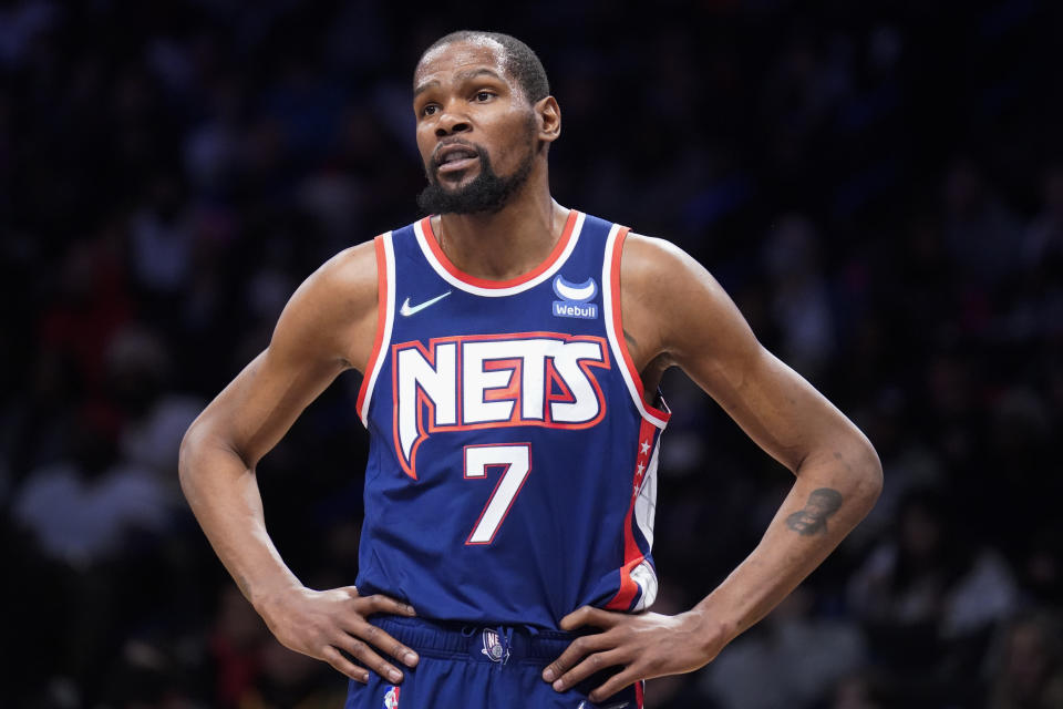 FILE - Brooklyn Nets forward Kevin Durant reacts to a referee's call during the first half of the team's NBA basketball game against the Miami Heat, Thursday, March 3, 2022, in New York. Kevin Durant has requested a trade from the Brooklyn Nets, according to a person with direct knowledge of the seismic decision that undoubtedly will have teams scrambling to put together enormous offers for the perennial All-Star.(AP Photo/John Minchillo, File)