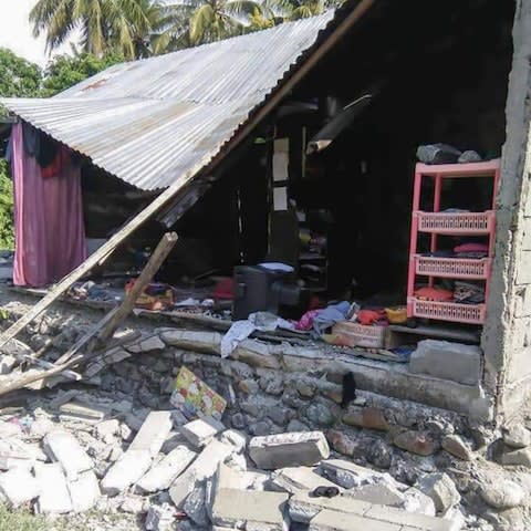 Damage from the 7.5 magnitude earthquake in Donggala, central Sulawesi - Credit: AFP