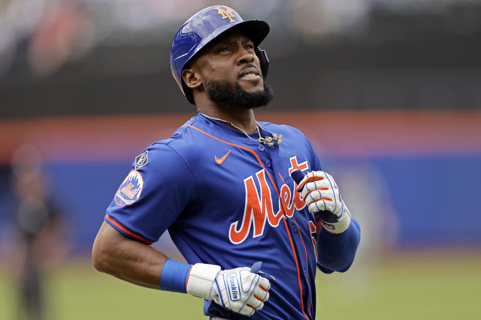 New York Mets' Starling Marte reacts after grounding out during the fourth inning of a baseball game against the Philadelphia Phillies, Tuesday, May 14, 2024, in New York. (AP Photo/Adam Hunger)