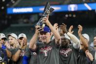 Texas Rangers manager Bruce Bochy celebrates after Game 7 of the baseball AL Championship Series against the Houston Astros Monday, Oct. 23, 2023, in Houston. The Rangers won 11-4 to win the series 4-3. (AP Photo/David J. Phillip)