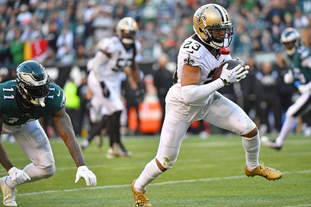 Jan 1, 2023; Philadelphia, Pennsylvania, USA; New Orleans Saints cornerback Marshon Lattimore (23) returns an interception for a touchdown during the fourth quarter against the Philadelphia Eagles at Lincoln Financial Field. Mandatory Credit: Eric Hartline-USA TODAY Sports