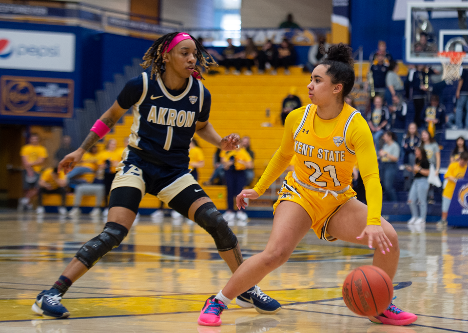 Akron's Dominique Camp defends Kent State's Dionna Gray on Saturday, Feb. 18, 2023.