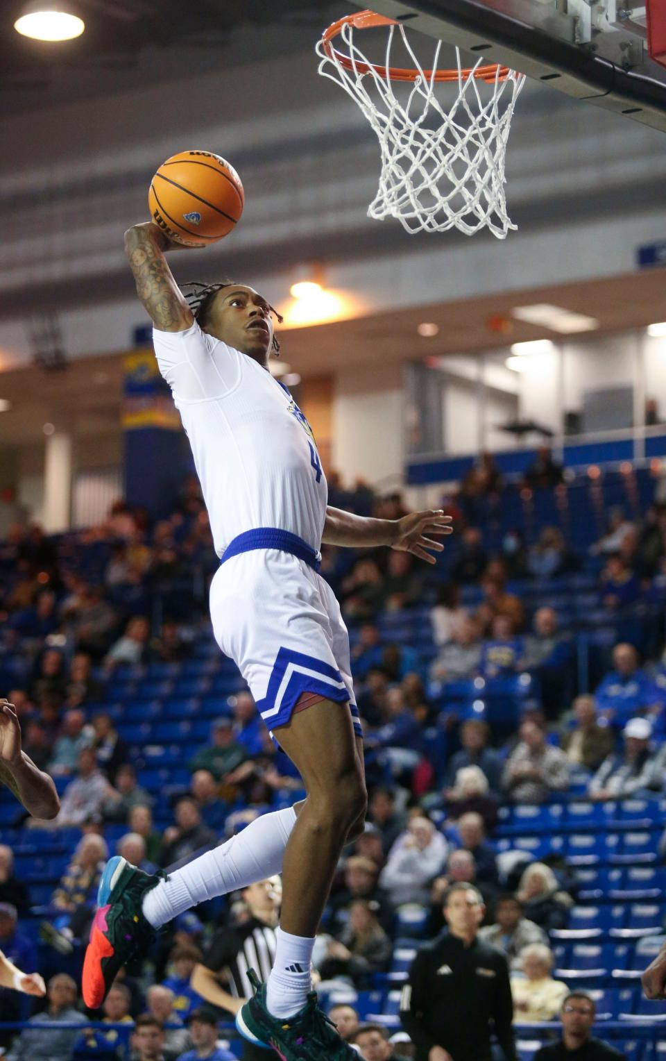 Delaware's Niels Lane moves in for a slam in the second half of Delaware's 80-53 win against Hampton to start league play, Thursday, Jan. 4, 2024 at the Bob Carpenter Center.