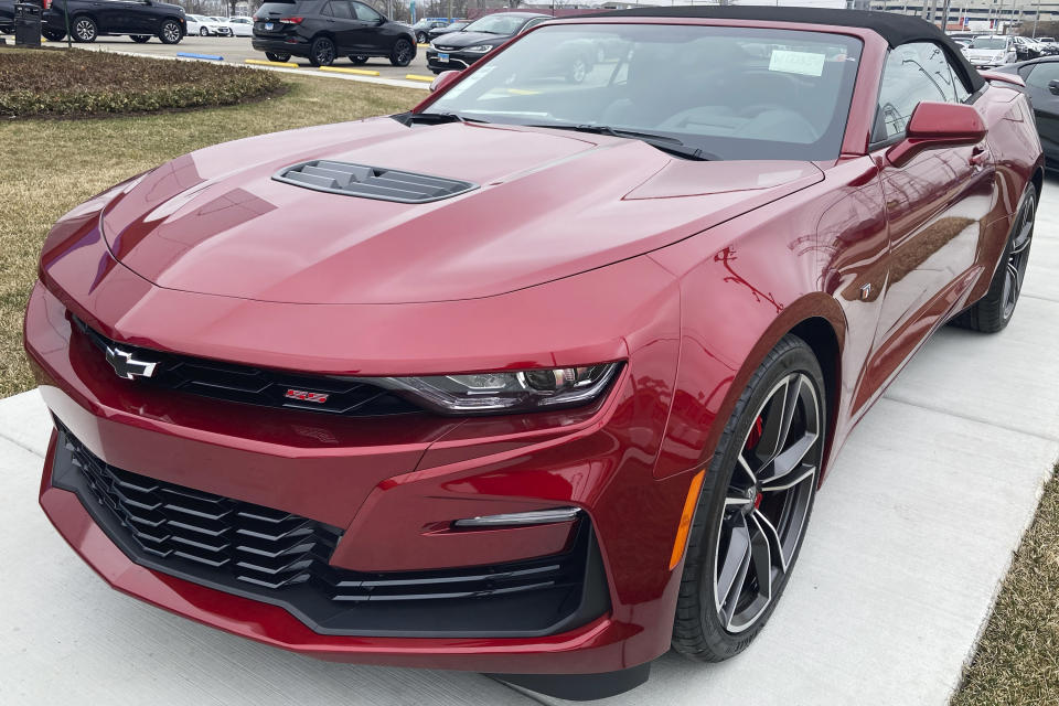 A 2023 Chevy Camaro 2SS Convertible is seen at a Chevy dealership in Wheeling, Ill., Wednesday, March 22, 2023. The Chevrolet Camaro is going out of production. General Motors, which sells the brawny muscle car, said Wednesday, March 22, 2023 it will stop making the current generation early next year. (AP Photo/Nam Y. Huh)