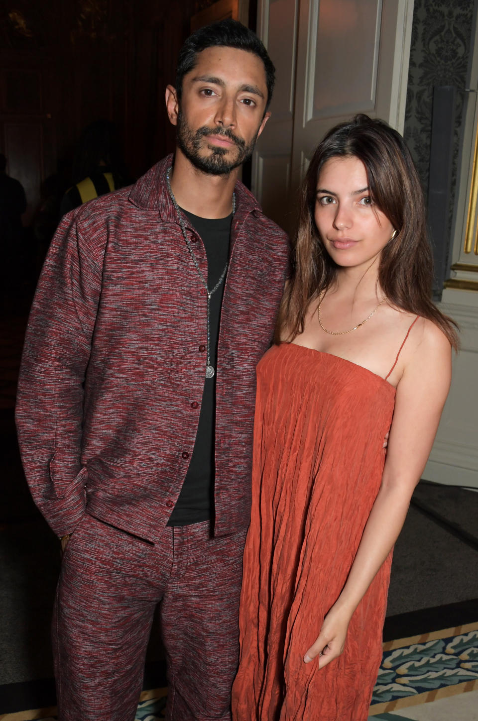 Close-up of Riz and Fatima at a press event