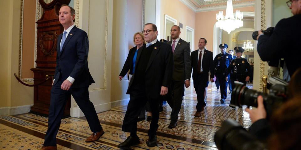 FILE PHOTO: House Managers Rep. Adam Schiff (D-CA) and Rep. Jerry Nadler (D-NY) walk to the Senate Floor for the start of the Senate impeachment trial of U.S. President Donald Trump in Washington, U.S., January 21, 2020. REUTERS/Mary F. Calvert