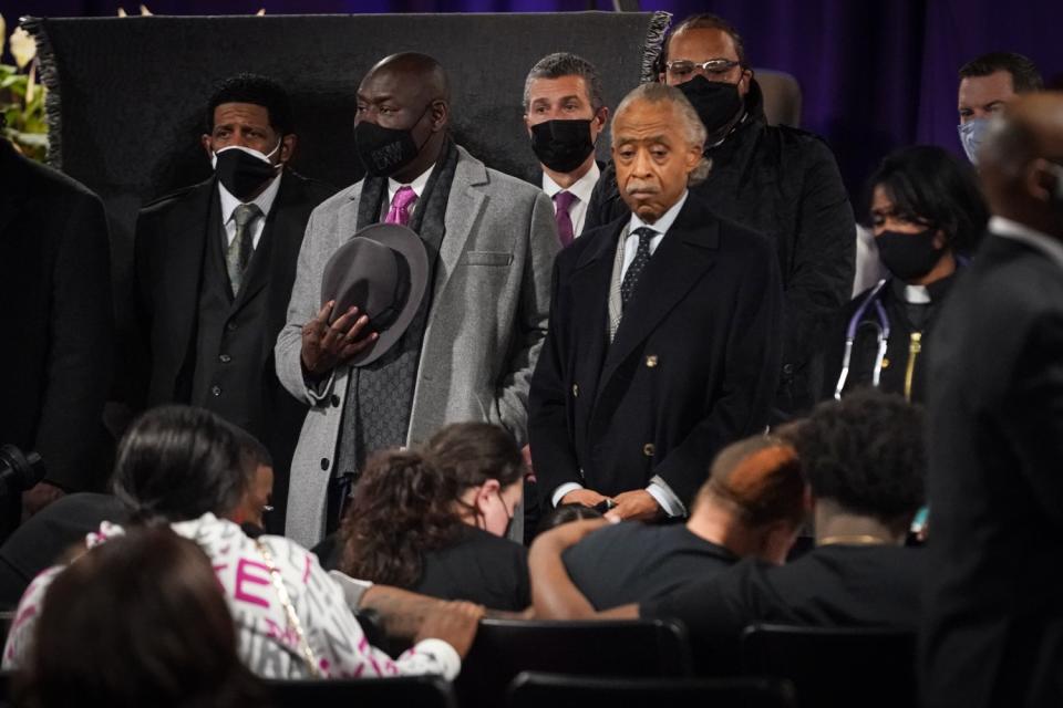 The Rev. Al Sharpton and lawyer Benjamin Crump