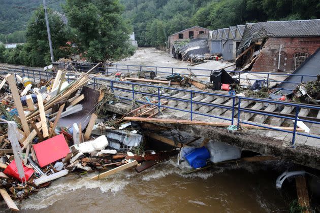 This picture taken in Pepinster on July 16, 2021 shows debris piled up next to a bridge after the flood. The situation remains critical as the water keep rising after the heavy rainfall of the previous days. - The death toll from devastating floods in Europe soared to at least 126 on July 16, 2021, most in western Germany where emergency responders were frantically searching for missing people. In Belgium, the government confirmed the death toll had jumped to 20 -- earlier reports had said 23 dead -- with more than 21,000 people left without electricity in one region. (Photo by François WALSCHAERTS / AFP) (Photo by FRANCOIS WALSCHAERTS/AFP via Getty Images) (Photo: FRANCOIS WALSCHAERTS via Getty Images)