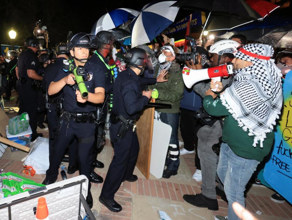 Law enforcement officers enter a pro-Palestinian protest encampment at the University of California Los Angeles (UCLA) (REUTERS)