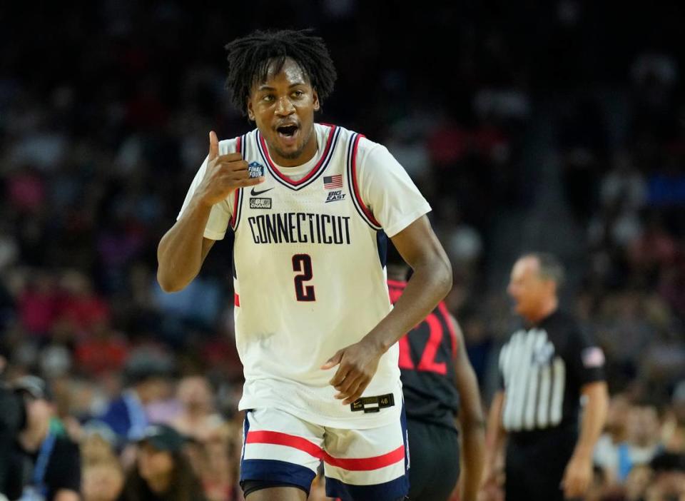 Connecticut Huskies guard Tristen Newton (2) celebrates a three-point basket against the San Diego State Aztecs in the national championship game of the 2023 NCAA Tournament at NRG Stadium.