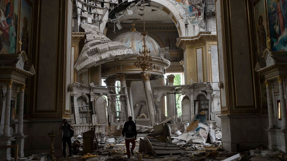 Church personnel inspect damages inside the Odesa Transfiguration Cathedral.  - Jae C. Hong/AP