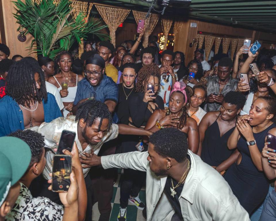 People dance at The Shrine, a weekly party on Saturdays at Red Rooster Overtown where DJs play amapiano, dancehall, reggae and afrobeats. Amapiano is a genre of house music coming straight from South Africa.