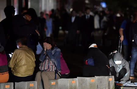 People react during blackout after a powerful earthquake hit the area in Sapporo, Japan in this photo taken by Kyodo September 6, 2018. Mandatory credit Kyodo/via REUTERS ATTENTION EDITORS - THIS IMAGE WAS PROVIDED BY A THIRD PARTY. MANDATORY CREDIT. JAPAN OUT. NO COMMERCIAL OR EDITORIAL SALES IN JAPAN.
