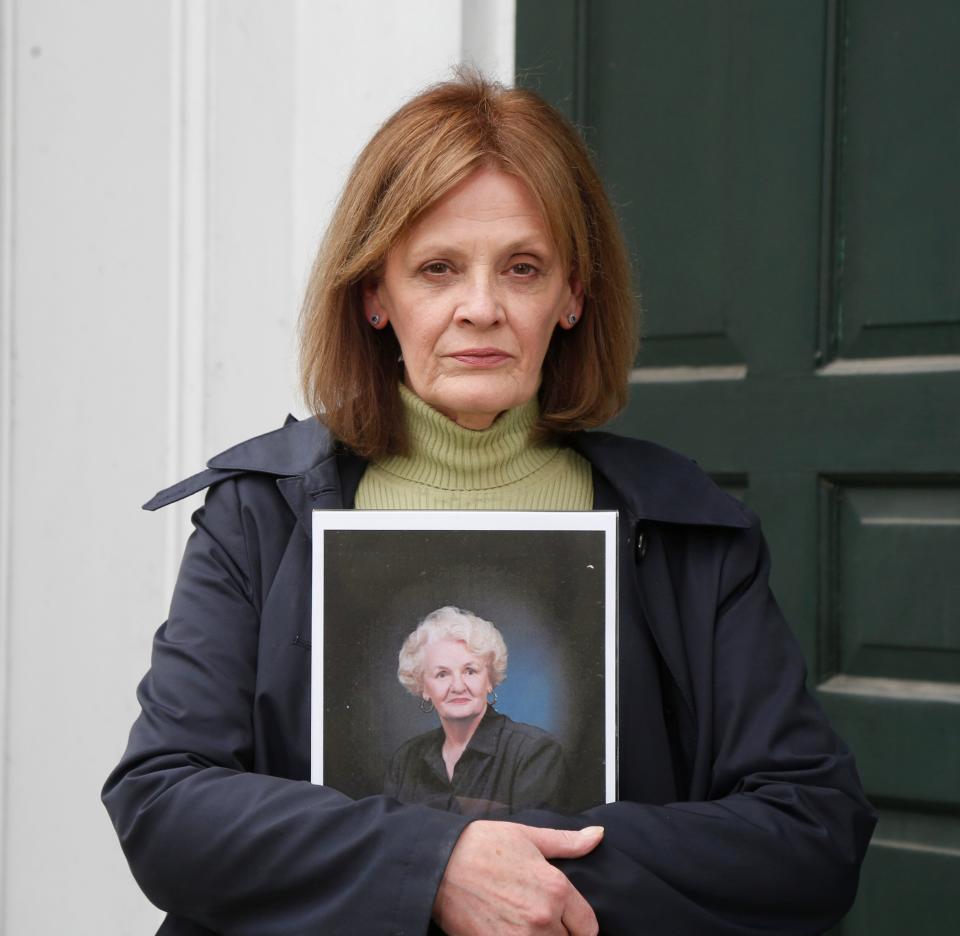 Kathleen Cole holds a portrait of her mother Dolores McGoldrick at Hurley Reformed Church on April 29, 2020. McGoldrick succumbed to COVID-19  at Northern Dutchess Hospital on April 17.