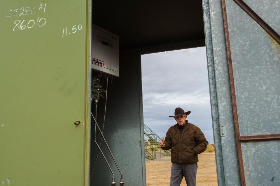 Don Schrieber shows one of the oldest natural gas well meters in the area of his ranch, Well 30-039-07426, which was drilled June 3rd, 1953  in the San Juan Basin. Schrieber, a rancher turned activist it the San Juan Basin, has pushed for more consolidation and upkeep on the wells by the operating companies.