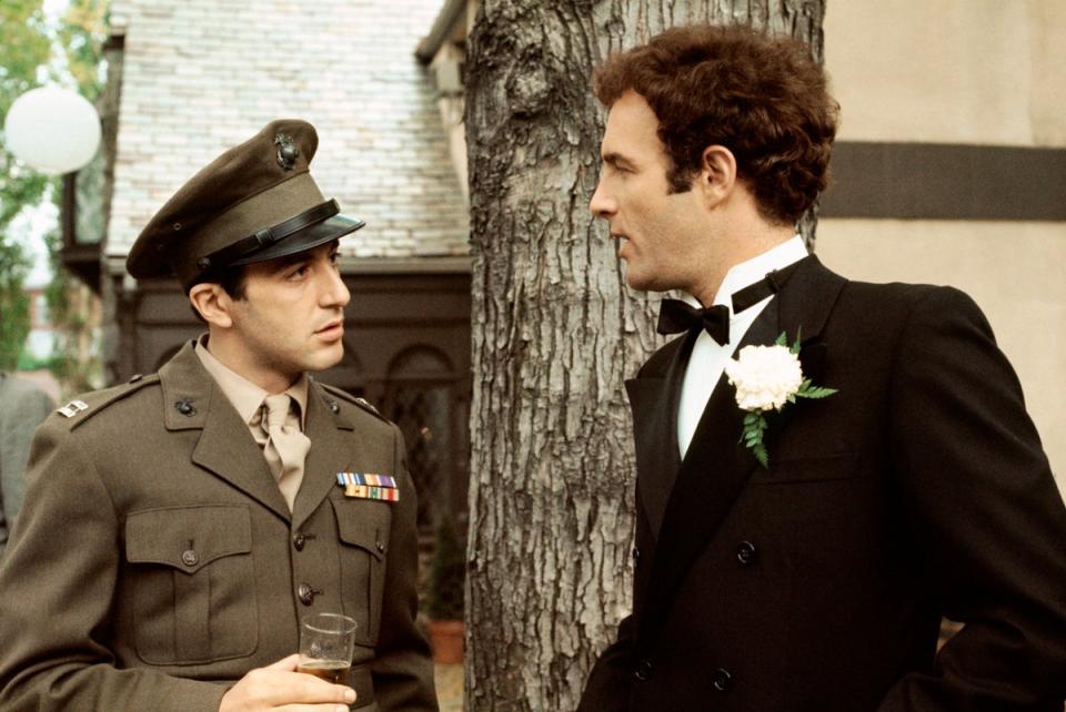 Al Pacino as Michael Corleone, left and James Caan as Sonny Corleone in a scene from 