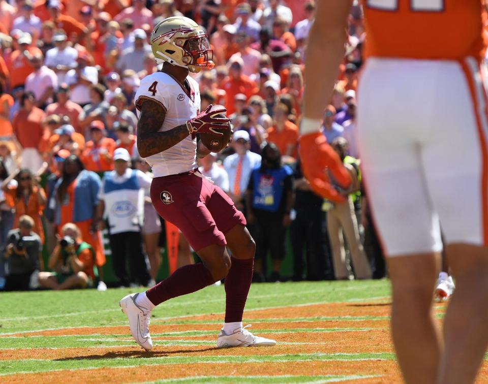 Florida State University receiver Keon Coleman (4) scores during the second quarter Sep 23, 2023; Clemson, South Carolina, USA; at Memorial Stadium.