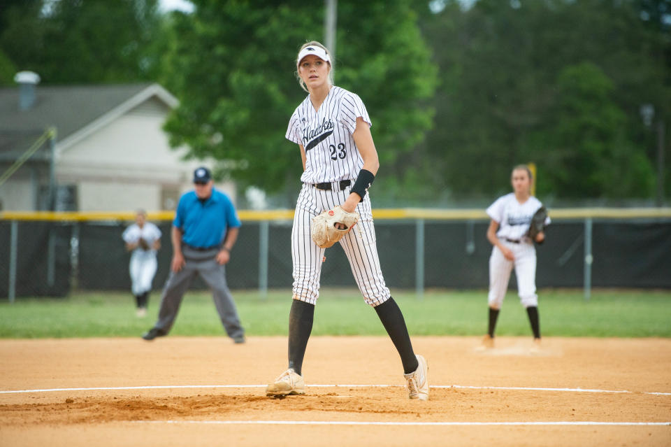 North Buncombe's Karlyn Pickens (23) pitches during their playoff game against North Lincoln on May 12, 2022. Pickens, now at Tennessee, has given freshman Sadie Jo Hunter advice.