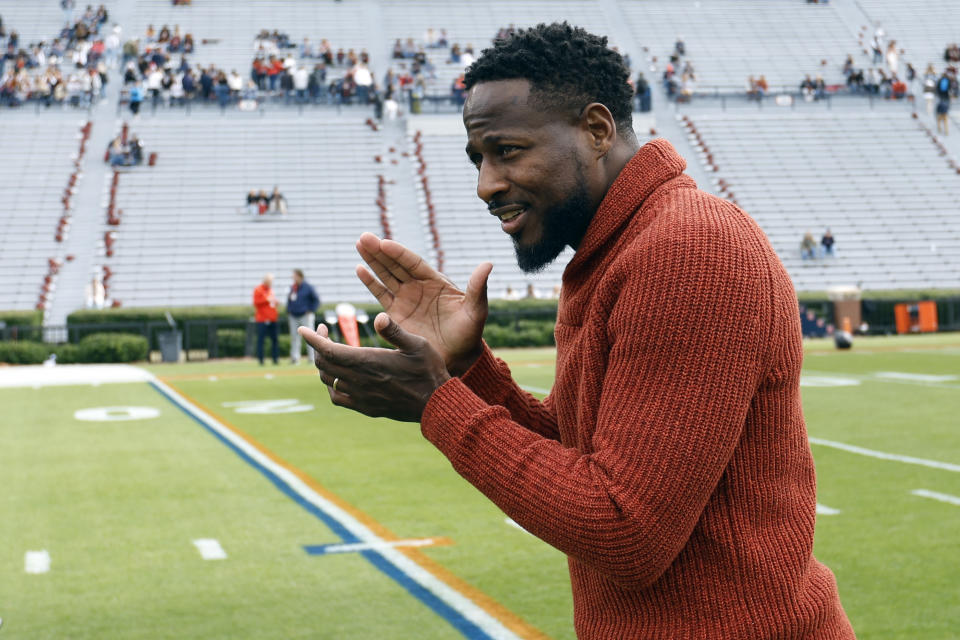 Auburn interim head coach Carnell Williams walks the field before an NCAA college football game against Western Kentucky Saturday, Nov. 19, 2022, in Auburn, Ala. (AP Photo/Butch Dill)