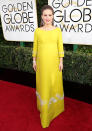 <p>Best Actress nominee Natalie Portman (Jackie) turned heads upon arriving at the 74th Golden Globe Awards in a classic chartreuse frock fit for a first lady. The Prada dress accentuated her baby bump, while diamond earrings perfectly framed her face. (Photo by Neilson Barnard/NBCUniversal/NBCU Photo Bank via Getty Images) </p>