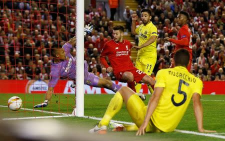 Britain Football Soccer - Liverpool v Villarreal - UEFA Europa League Semi Final Second Leg - Anfield, Liverpool, England - 5/5/16. Adam Lallana scores the third goal for Liverpool. Action Images via Reuters / Lee Smith