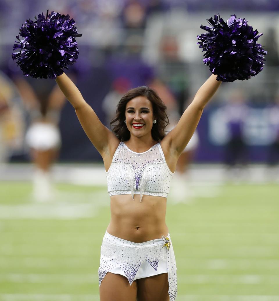 <p>A Minnesota Vikings cheerleader performs before the start of an NFL football game between the Indianapolis Colts and the Minnesota Vikings Sunday, Dec. 18, 2016, in Minneapolis. (AP Photo/Charlie Neibergall) </p>