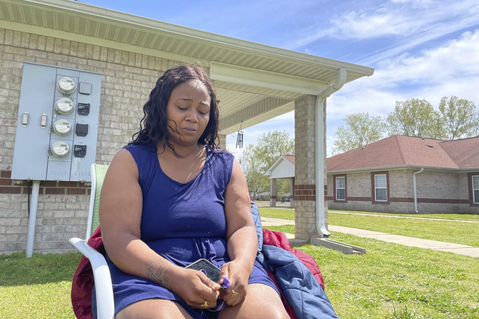 Queen'terica Jones speaks about her mother, Erica Moore, on Tuesday, March 28, 2023, in Rolling Fork, Miss. Moore was killed by a tornado that struck the small town in the Mississippi Delta on Friday, March 24. Jones described her mother as a "beautiful soul" who loved to pray. (AP Photo/Michael Goldberg)