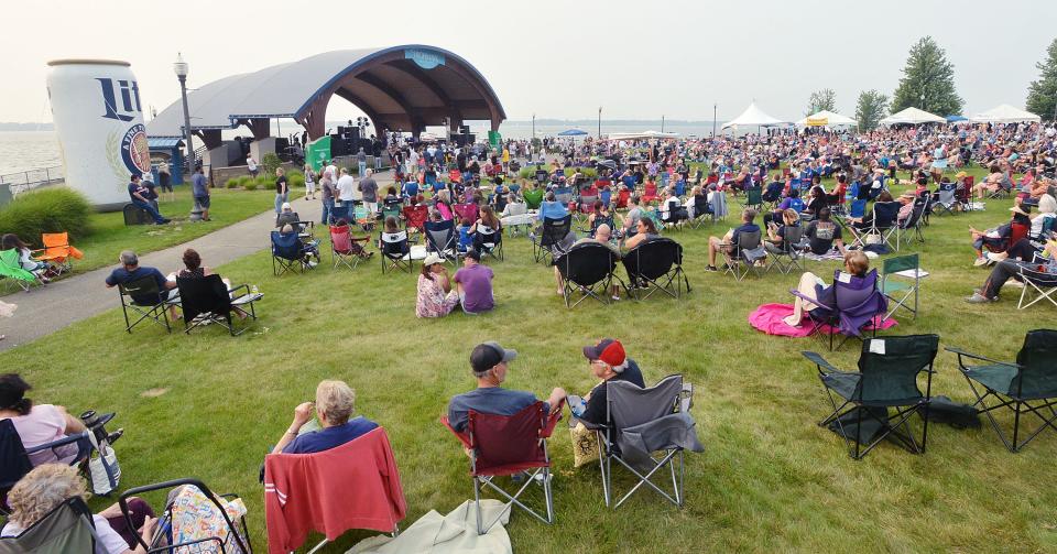 In this July 2021 file photo, people listen to the Breeze Band perform at the Highmark Amphitheater in Erie during ErieBank 8 Great Tuesdays.