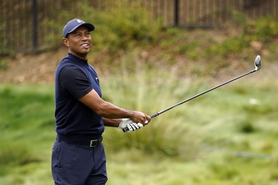 Tiger Woods watches his shot from the 11th fairway during the third round of the Zozo Championship golf tournament Saturday, Oct. 24, 2020, in Thousand Oaks, Calif. (AP Photo/Marcio Jose Sanchez)