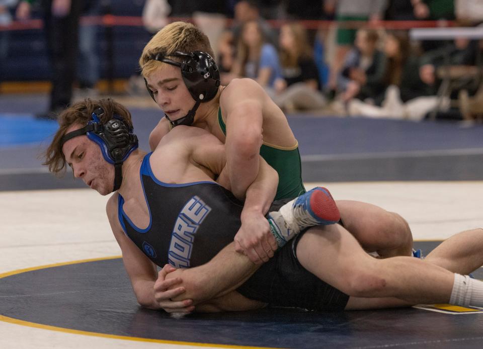 Brick Memorial's Anthony Santaniello (right) won the NJSIAA 132-pound Region 6 championship with a win by technical fall over Shore's Gabe Scalise.