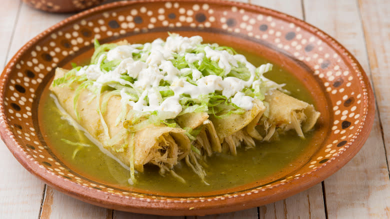 green enchiladas with crema