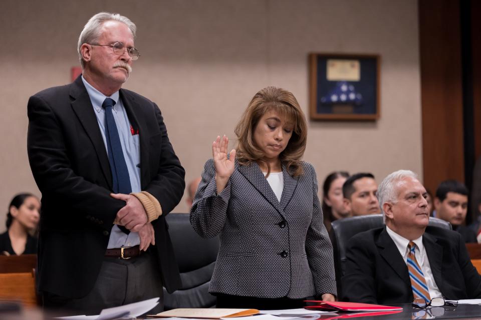 El Paso District Attorney Yvonne Rosales prepares to testify but invokes the Fifth Amendment right as she appears in court on Thursday, Dec. 1, 2022, on violations of the July gag order issued in the Walmart mass shooting case.