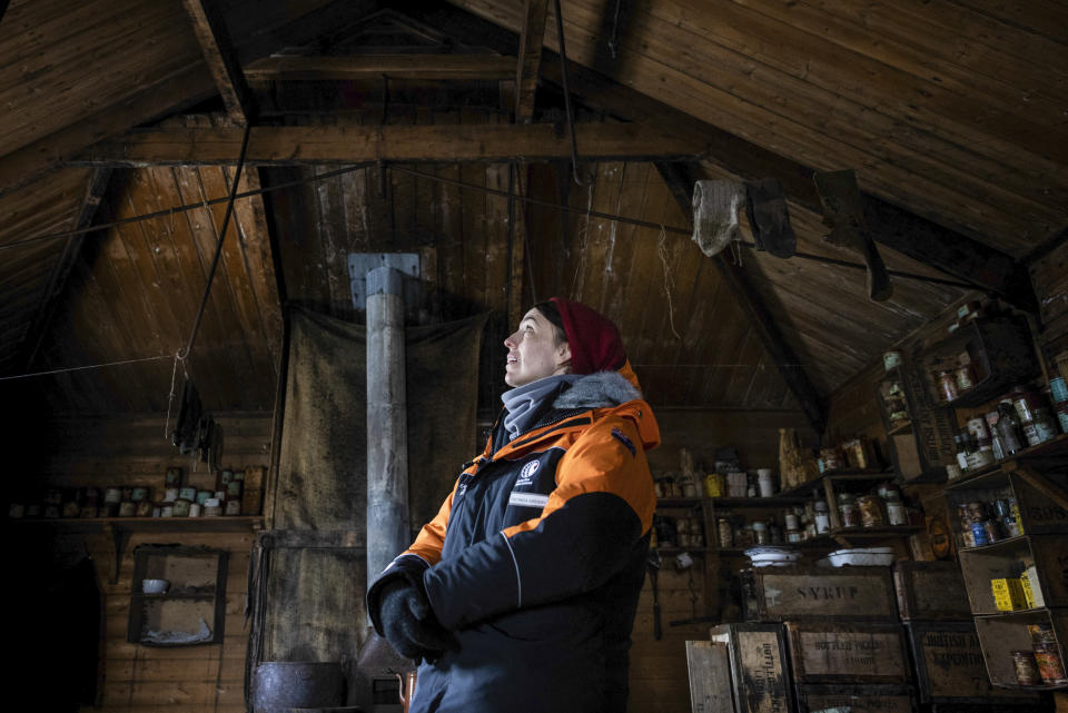 New Zealand Prime Minister Jacinda Ardern looks around Ernest Shackleton's Nimrod Expedition hut at Cape Royds on Ross Island in Antarctica, Thursday, Oct. 27, 2022. Ardern this week is making a rare visit by a world leader to Antarctica. She's seeing firsthand the research on global warming that's taking place and marking the 65th anniversary of New Zealand's Scott Base, which will soon be demolished to make way for a new base. (Mike Scott/NZ Herald/Pool Photo via AP)