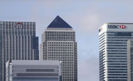 The Canary Wharf financial district is seen in east London November 12, 2014. REUTERS/Suzanne Plunkett